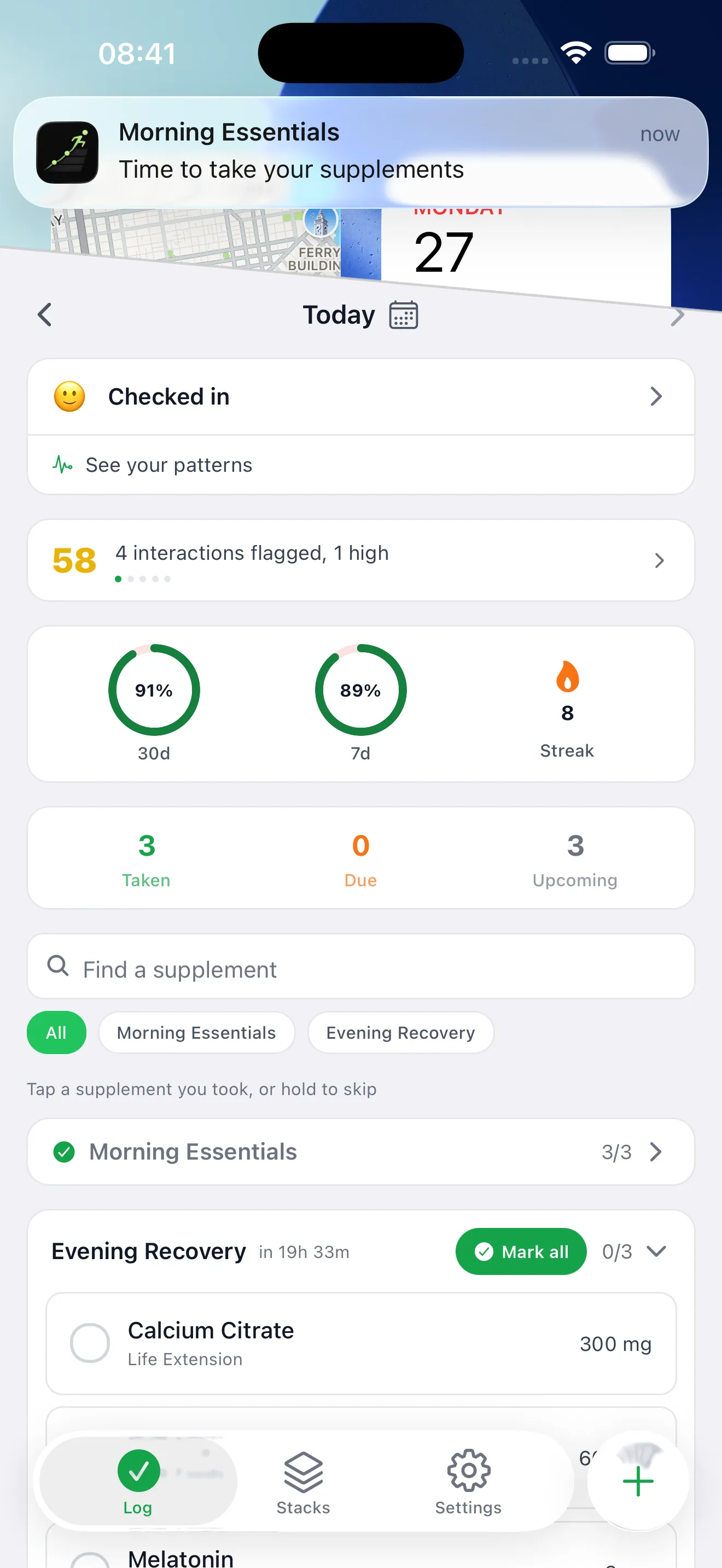 Daily intake view with a supplement reminder notification